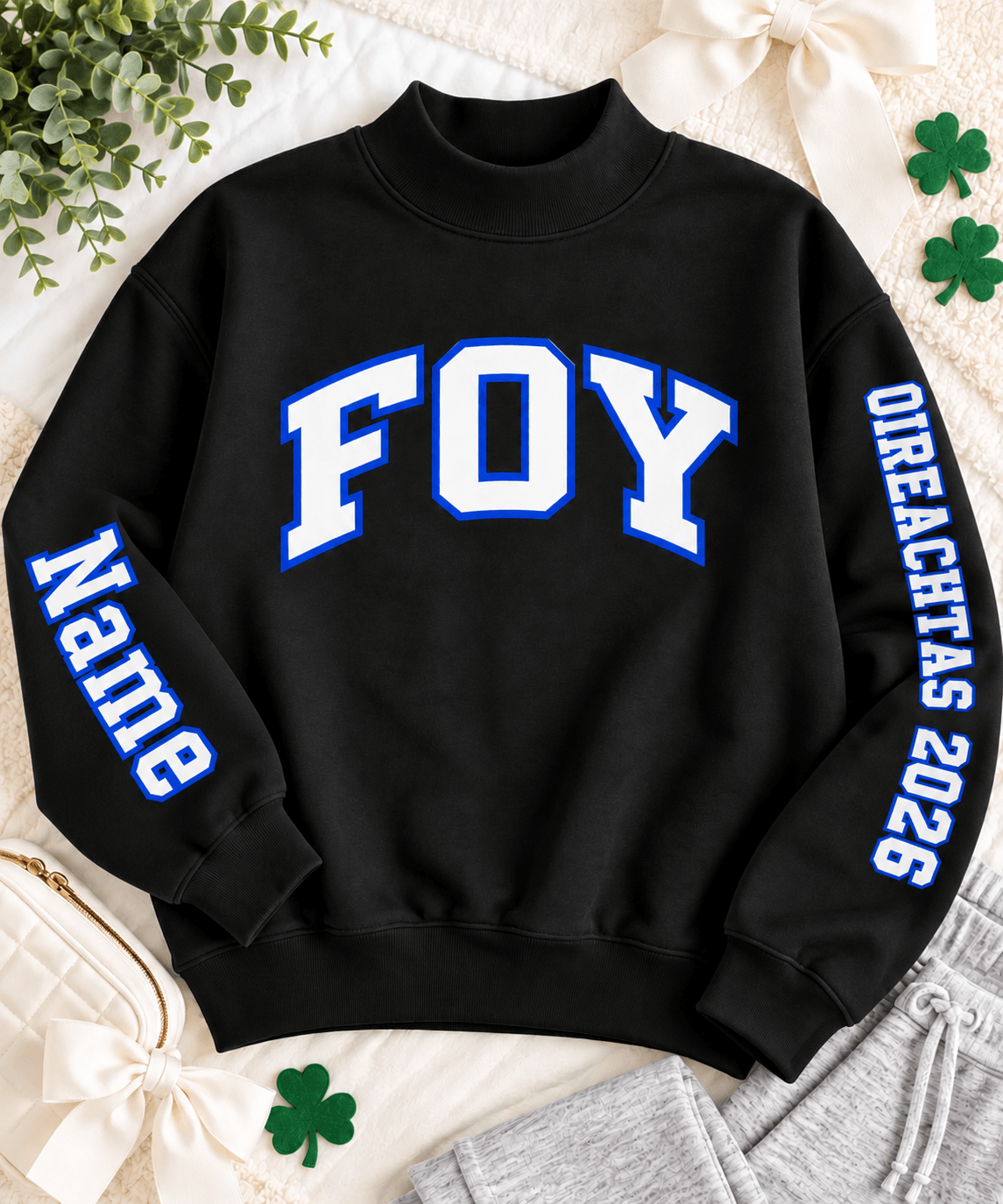 Foy Oireachtas 2026 personalized mockneck sweatshirt flat lay with FOY varsity lettering