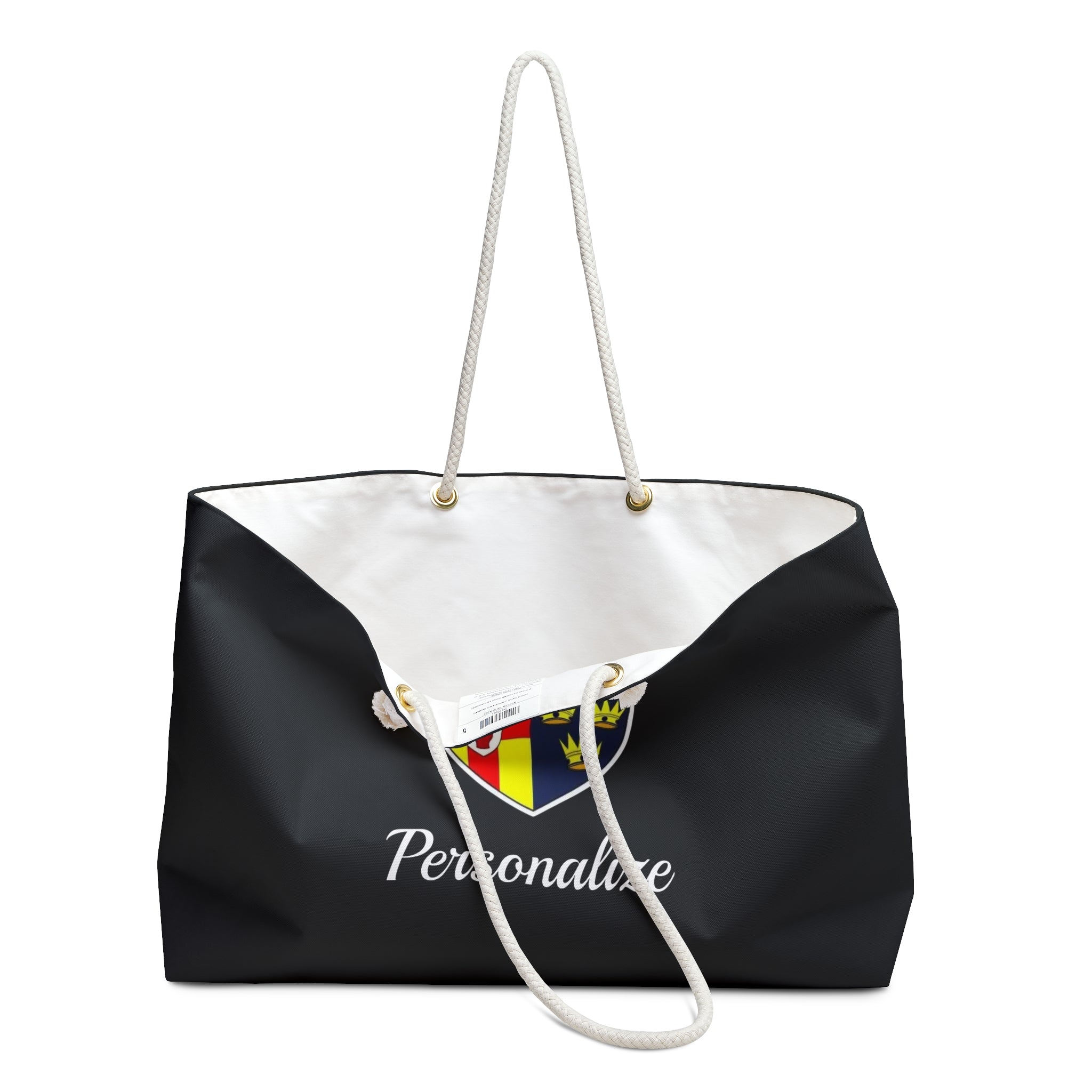 A black and white tote bag with a white rope handle, featuring a colorful shield crest and the word 'Personalize' printed on the front, set against a plain white background.