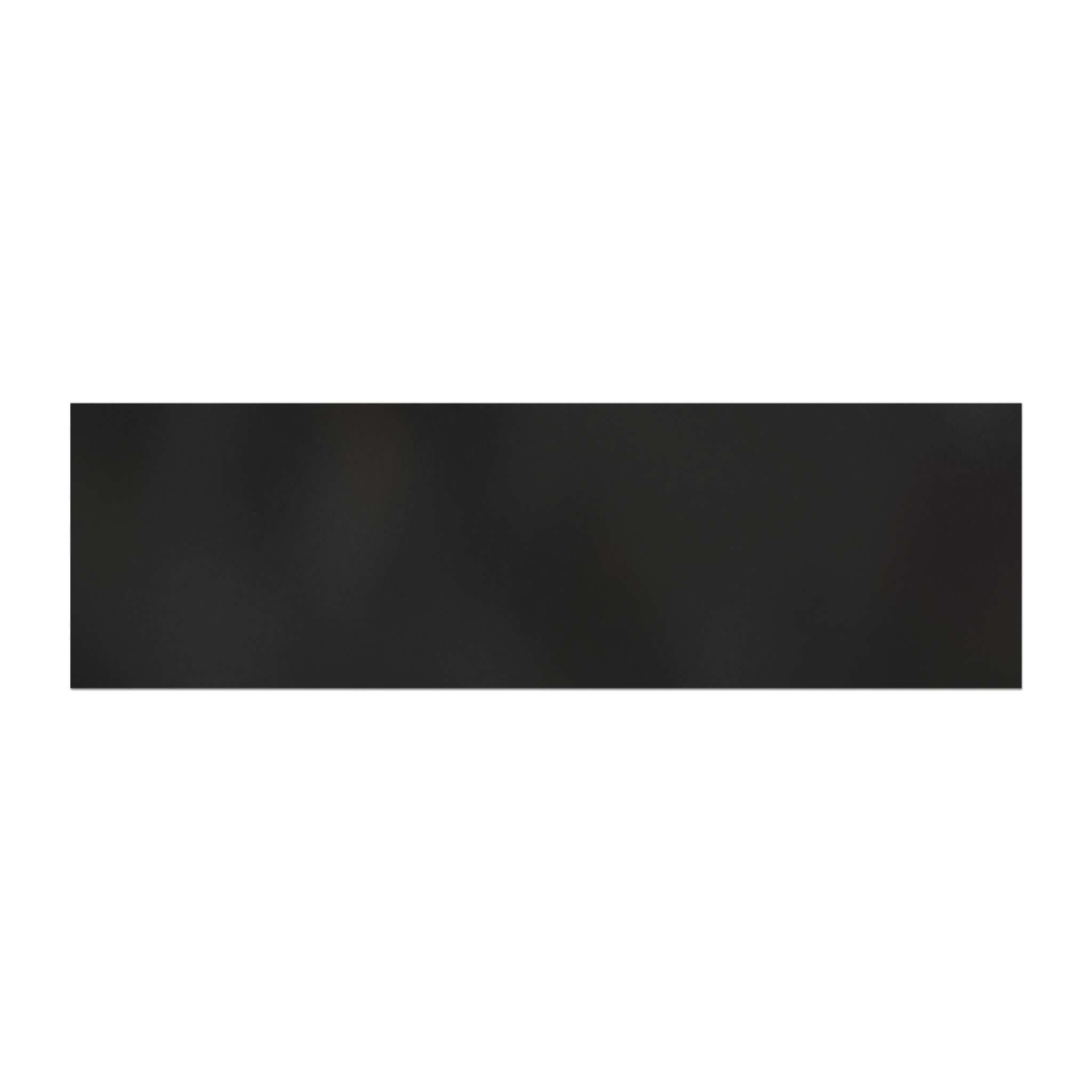 Black rectangular tile on a white background