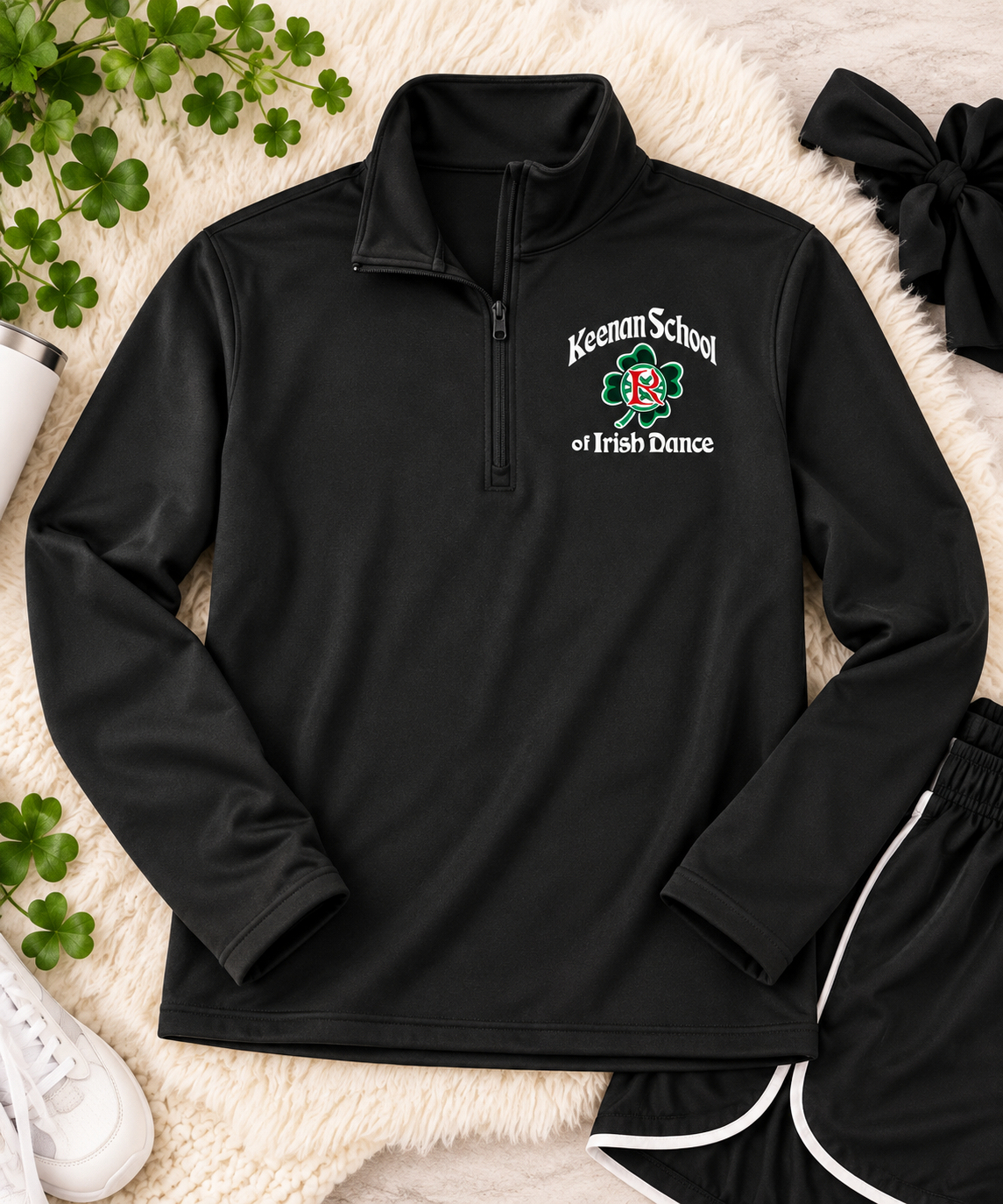 Keenan black quarter zip flat lay, Irish dance team gear for practice and travel
