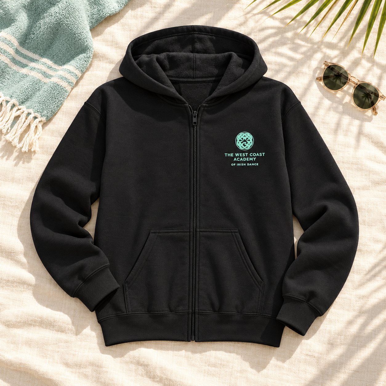 West Coast Academy of Irish Dance black zip hoodies with teal logo – adult and youth Irish dance school apparel