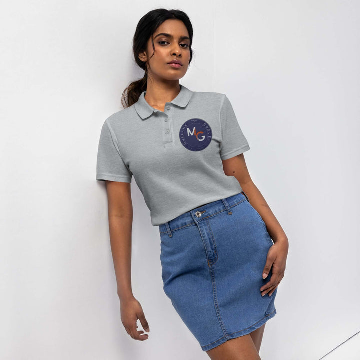 Mullane Godley Women’s pique polo shirtCasual and comfy to wear, this women’s polo shirt is a timeless addition to your closet. Made from textured pique fabric, it’s durable and breathable. This shirt is semi-fitted and has matching buttons for a touch of